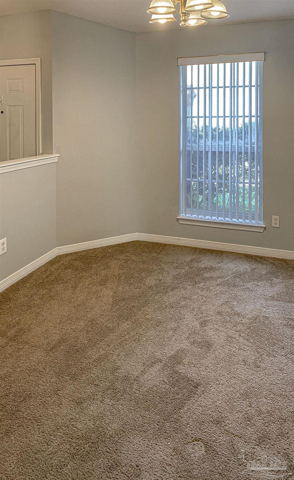 12611 Meadson Road Pensacola, FL 32506 - Photo 18 of 22 a view of an empty room with a window