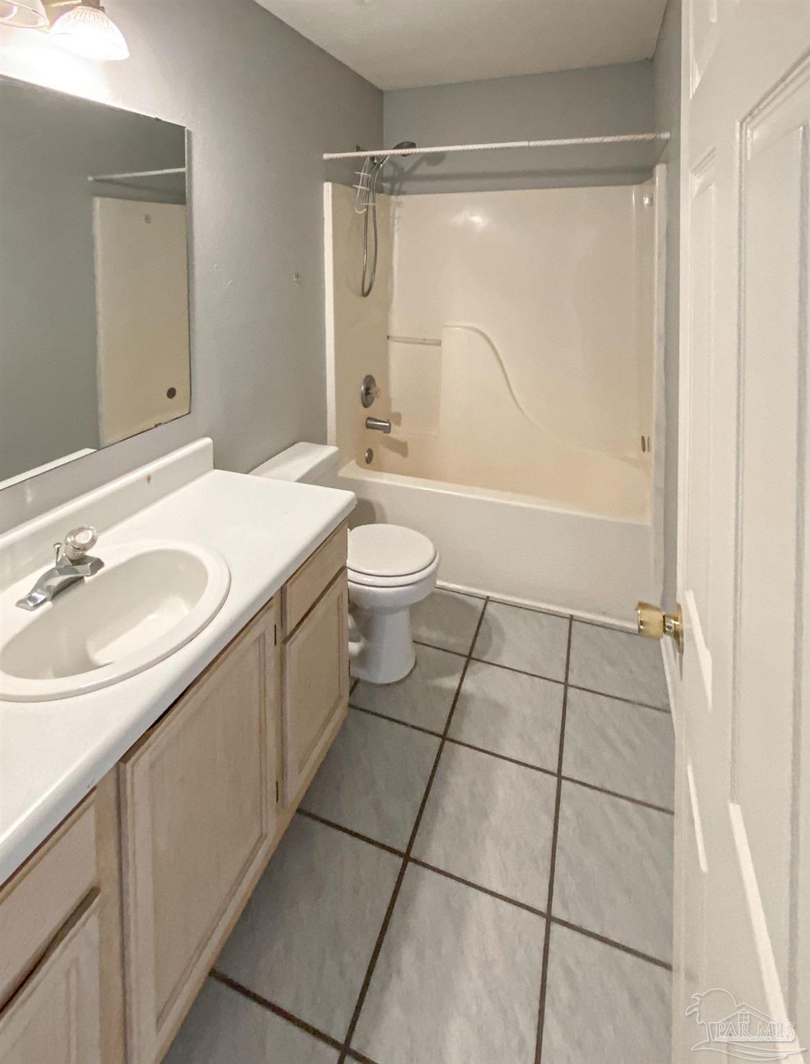 12611 Meadson Road Pensacola, FL 32506 - Photo 10 of 22 a bathroom with a sink toilet and shower