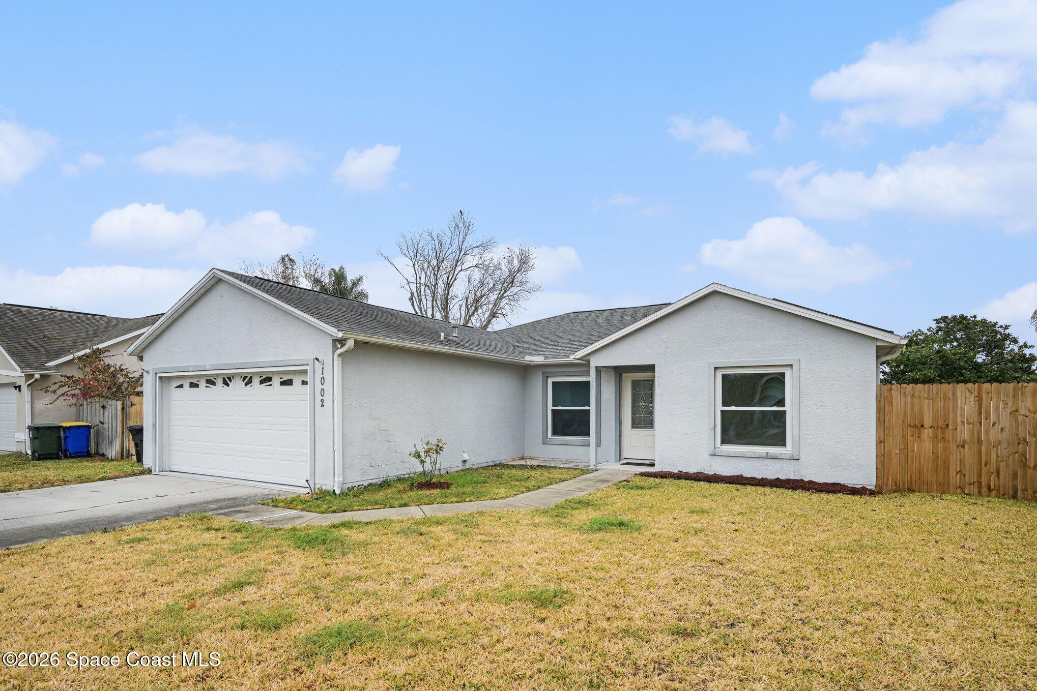 1002 Jacaranda Circle Rockledge, FL 32955 - Photo 4 of 27 004_file_6948