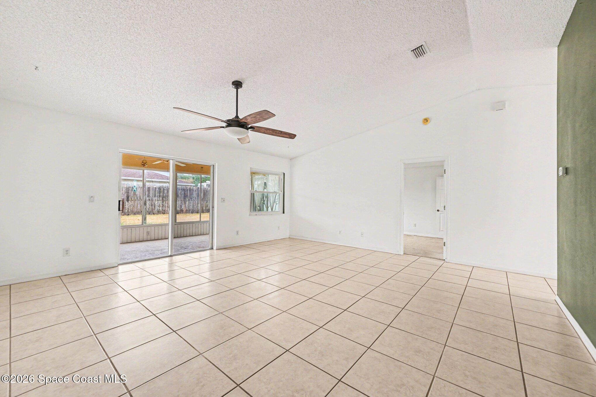 1002 Jacaranda Circle Rockledge, FL 32955 - Photo 6 of 27 006_file_9858
