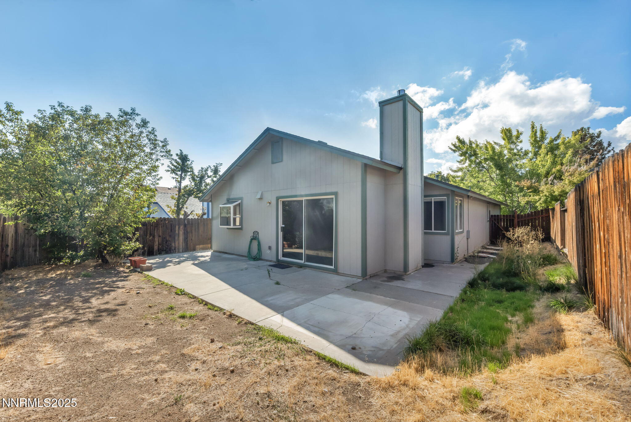 6339 Park Place Reno, NV 89523 - Photo 8 of 55 a front view of a house with garden