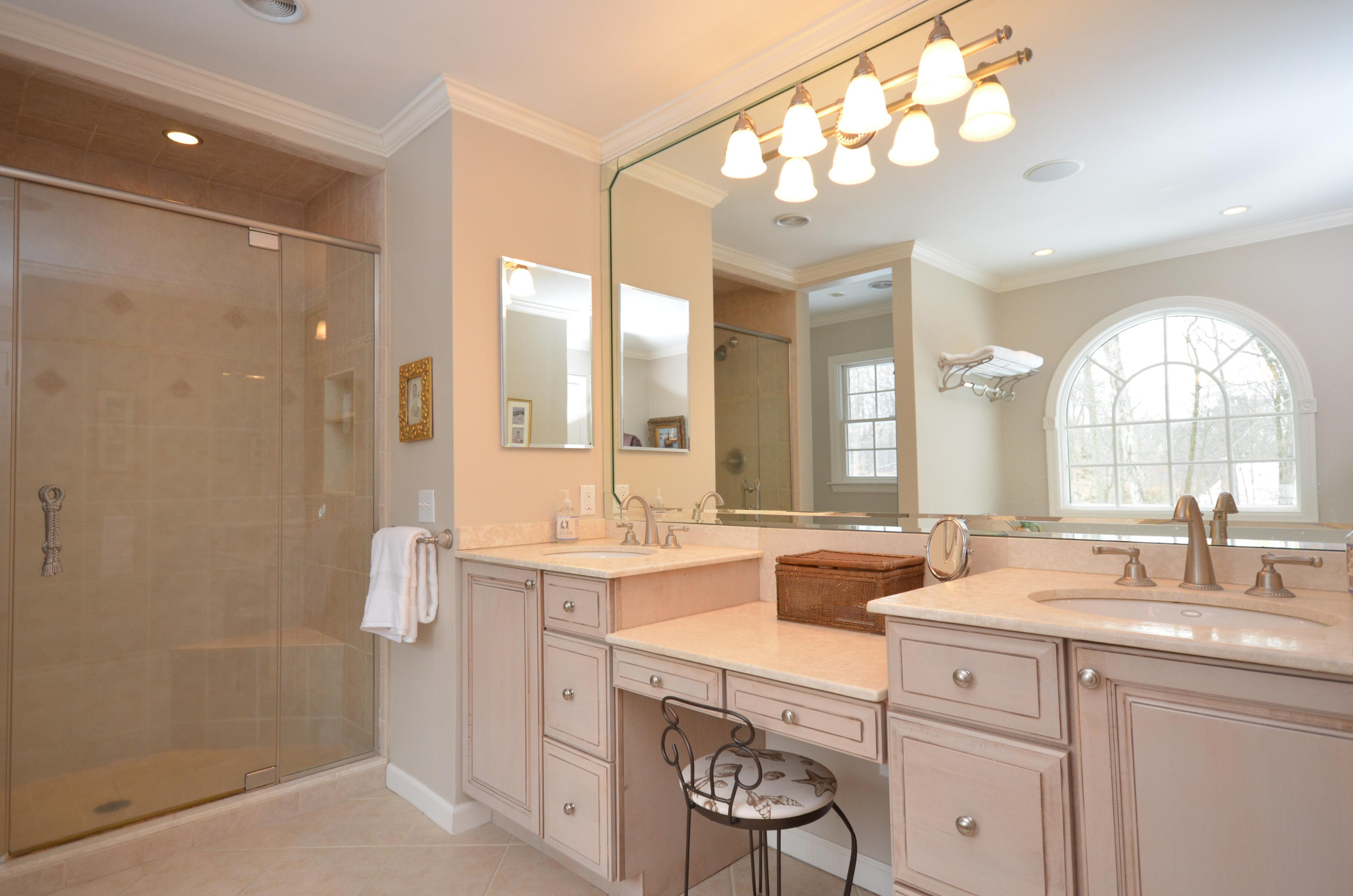 711 Hollow Tree Ridge Road Darien, CT 06820 - Photo 16 of 27 a bathroom with a double vanity sink mirror and double