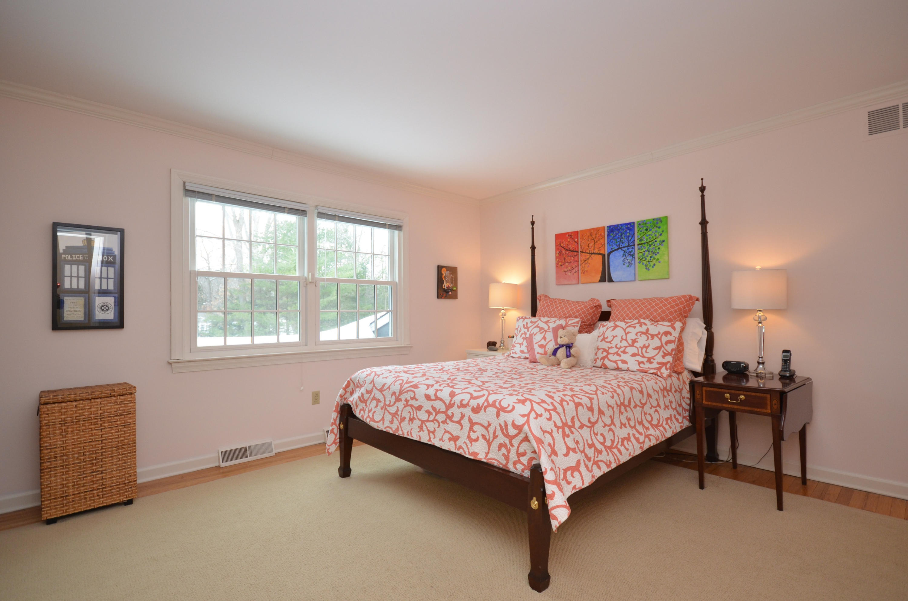 711 Hollow Tree Ridge Road Darien, CT 06820 - Photo 18 of 27 a bedroom with a bed and a window