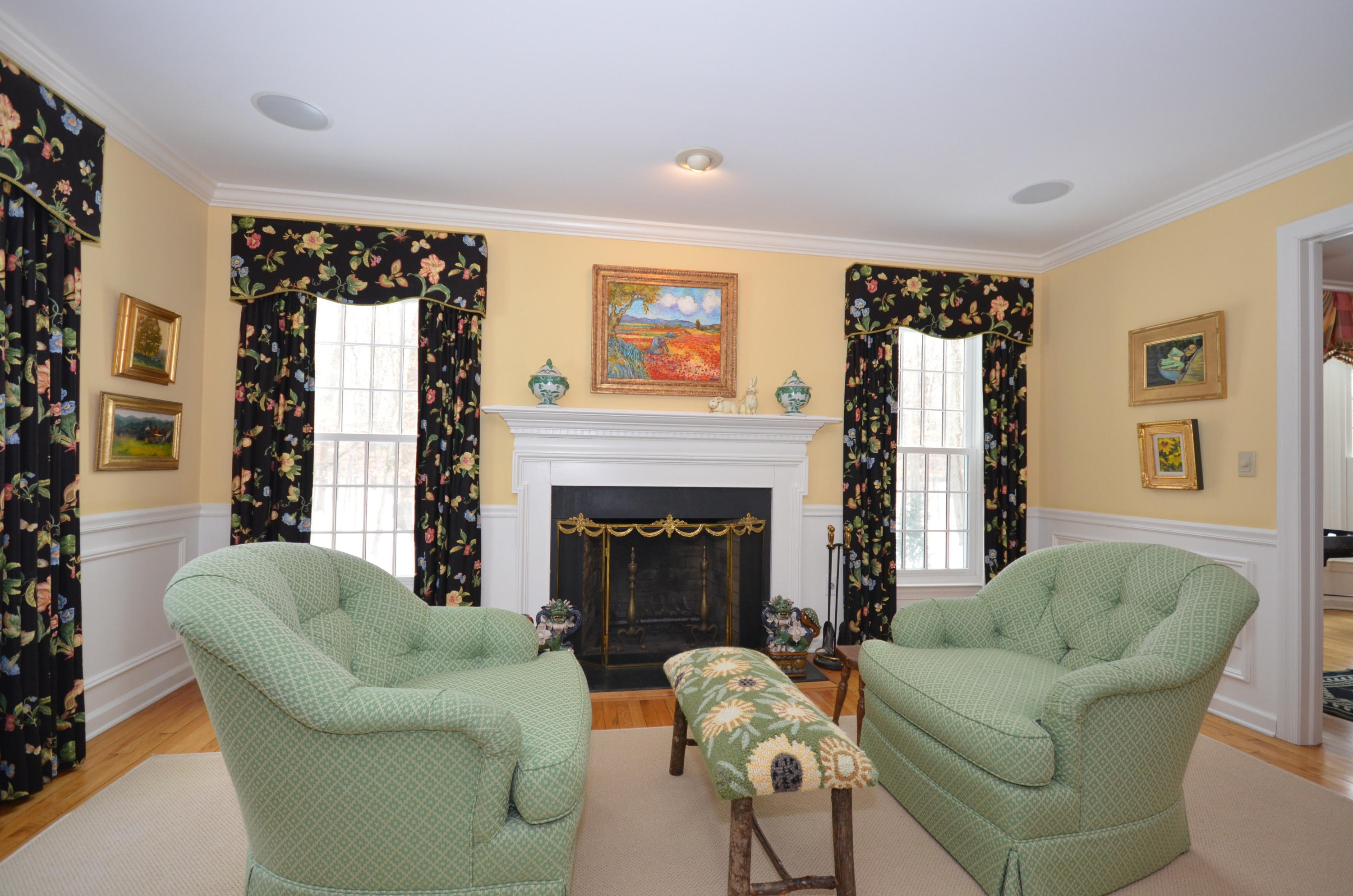 711 Hollow Tree Ridge Road Darien, CT 06820 - Photo 4 of 27 a living room with furniture and a fireplace