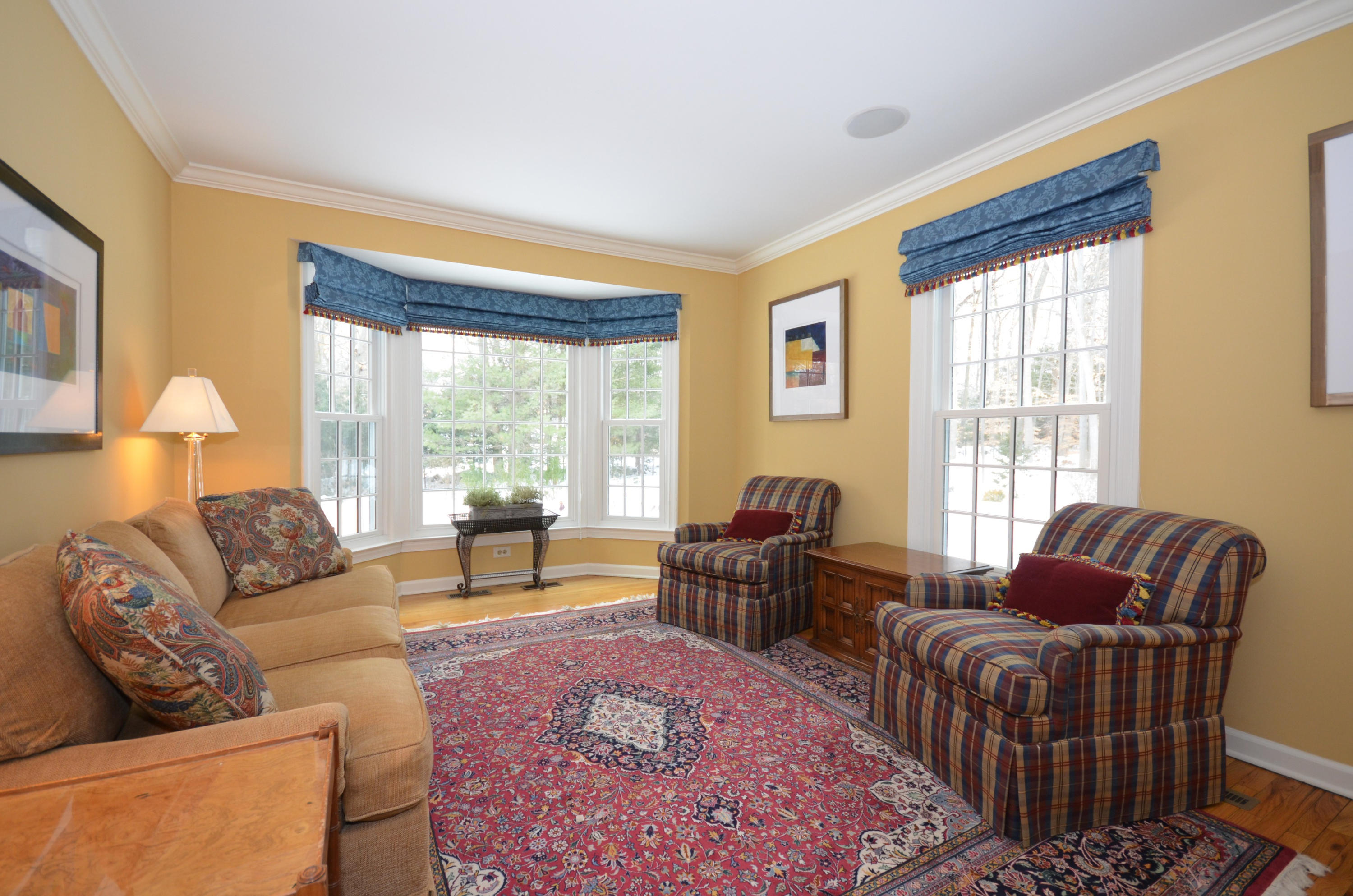 711 Hollow Tree Ridge Road Darien, CT 06820 - Photo 10 of 27 a living room with furniture and a window
