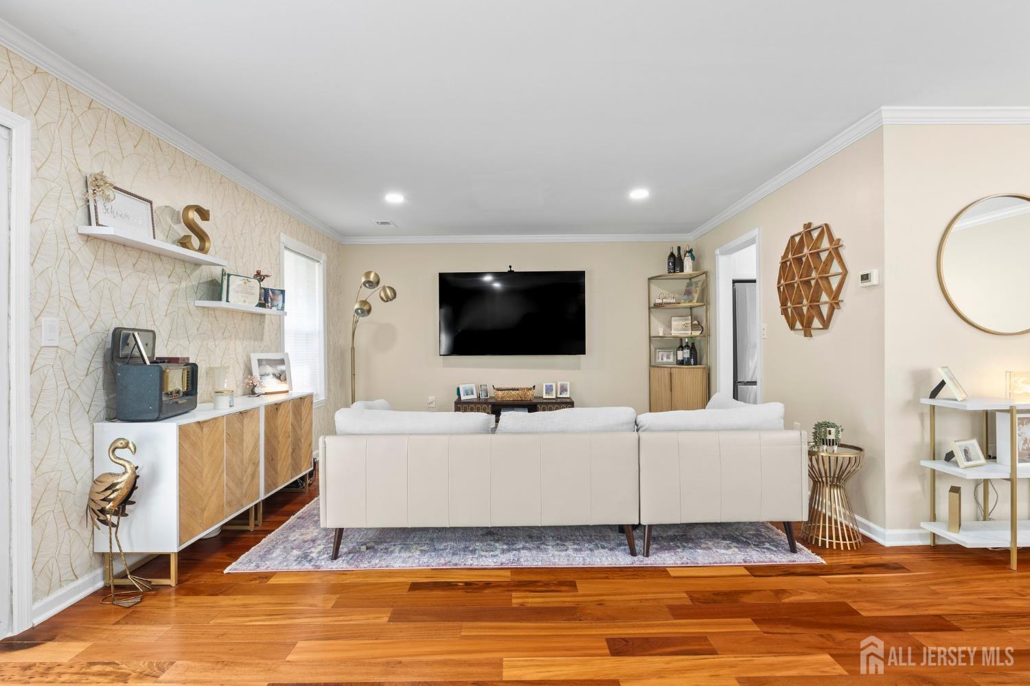 20 Lindsey Circle, Unit 20 Old Bridge, NJ 08857 - Photo 7 of 22 a living room with furniture and a flat screen tv