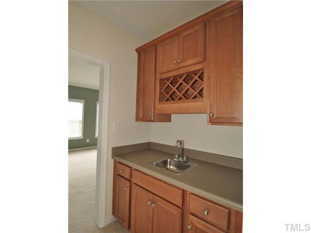 1129 Sandel Lane Raleigh, NC 27603 - Photo 3 of 12 A lovely butler's pantry is a great feature of this wonderful home.