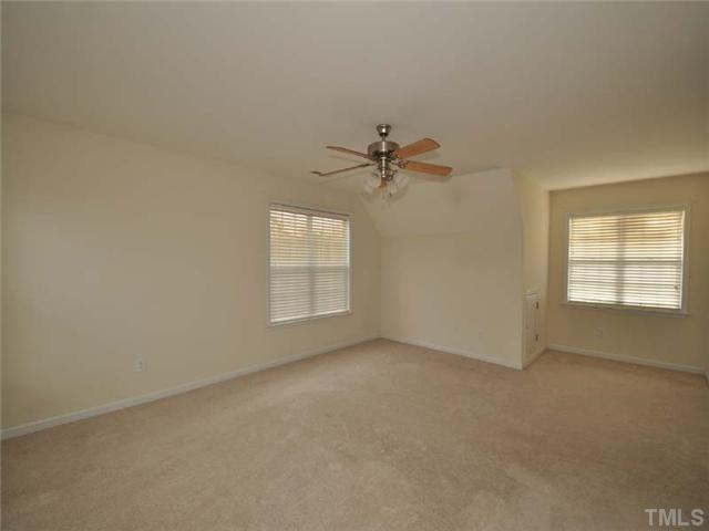 1129 Sandel Lane Raleigh, NC 27603 - Photo 9 of 12 The huge master bedroom has plenty of usable wall space, a spacious walk in closet, and lovely bath with garden tub and separate shower.