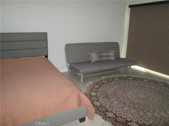 a bathroom with a toilet and shower