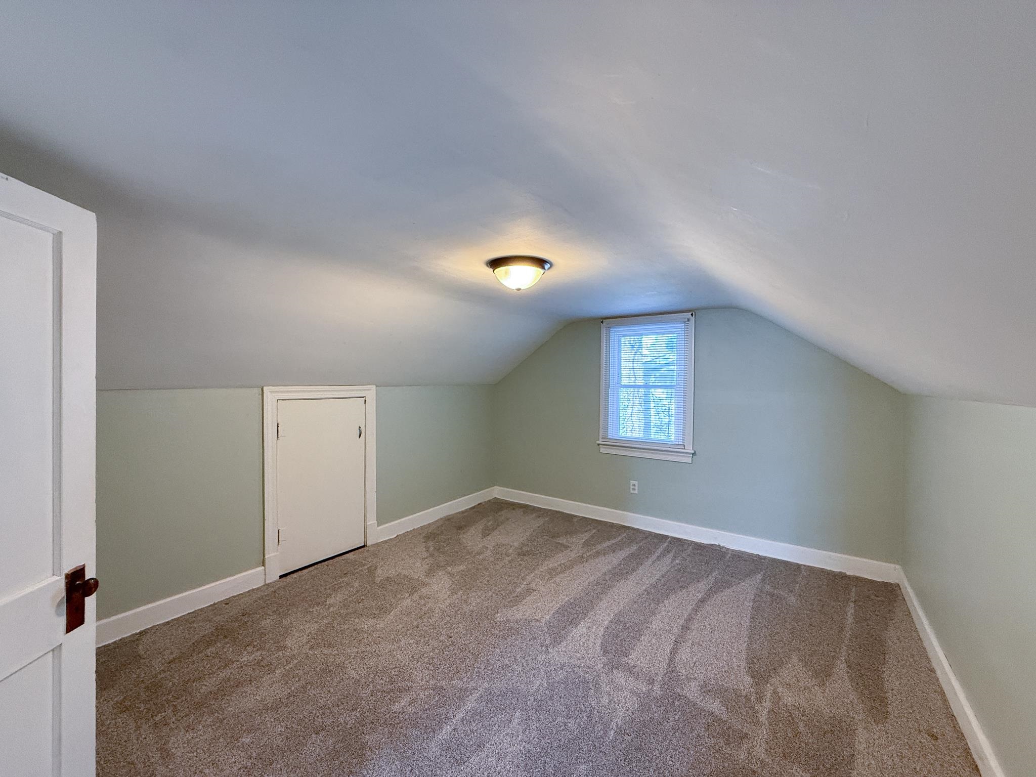703 Monroe Street Staunton, VA 24401 - Photo 20 of 21 a view of an empty room and window