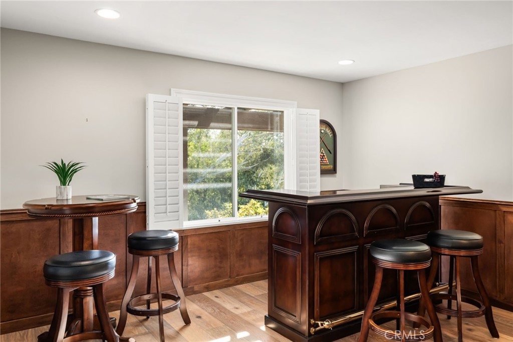2465 Via Oeste Drive Fallbrook, CA 92028 - Photo 16 of 44 a view of a dining room with furniture and window