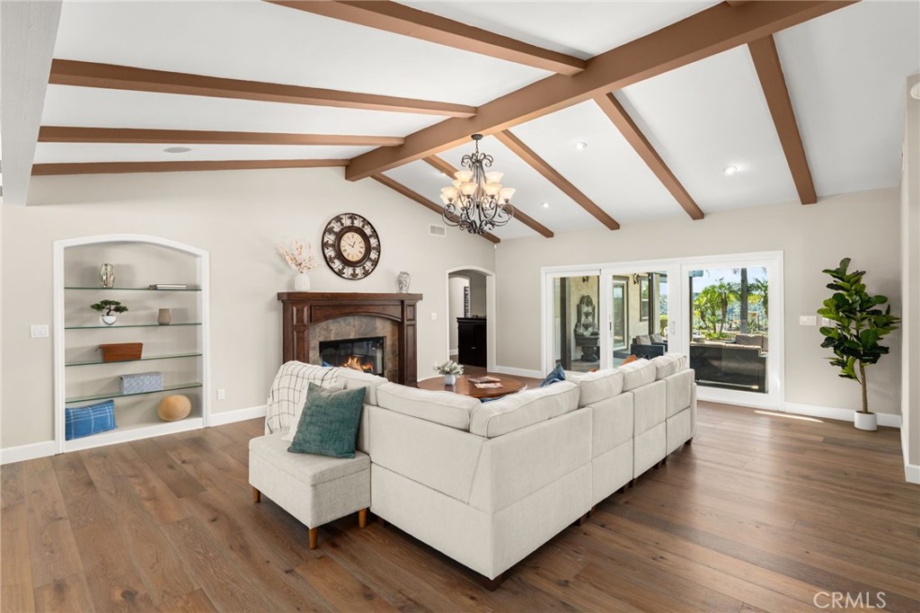 2465 Via Oeste Drive Fallbrook, CA 92028 - Photo 4 of 44 a living room with furniture and a fireplace
