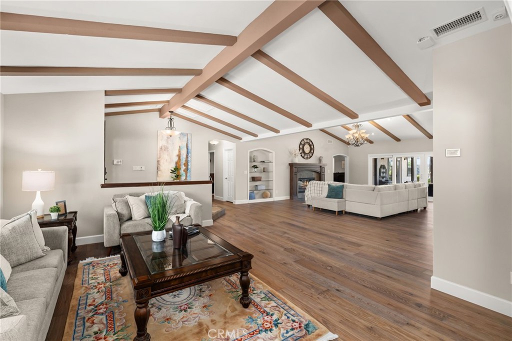 2465 Via Oeste Drive Fallbrook, CA 92028 - Photo 6 of 44 a living room with furniture and wooden floor