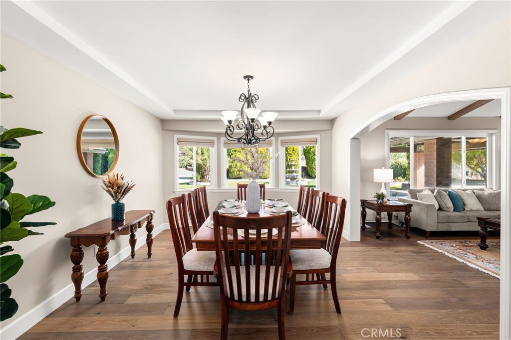 2465 Via Oeste Drive Fallbrook, CA 92028 - Photo 8 of 44 a view of a dining room with furniture window and wooden floor