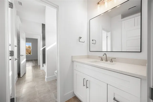 a bathroom with a bathtub and a toilet