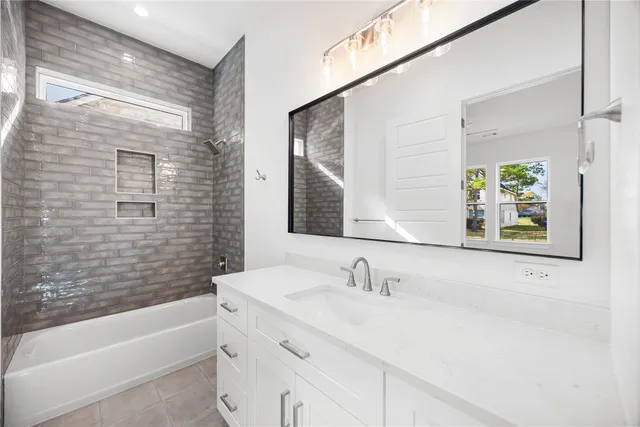 a bathroom with a sink and a bathtub