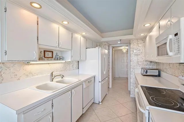 a bathroom with a sink double vanity and a mirror