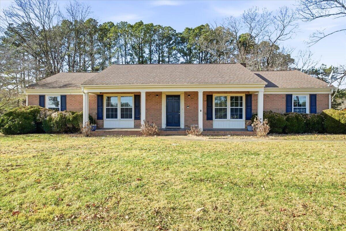 front view of a house with a yard