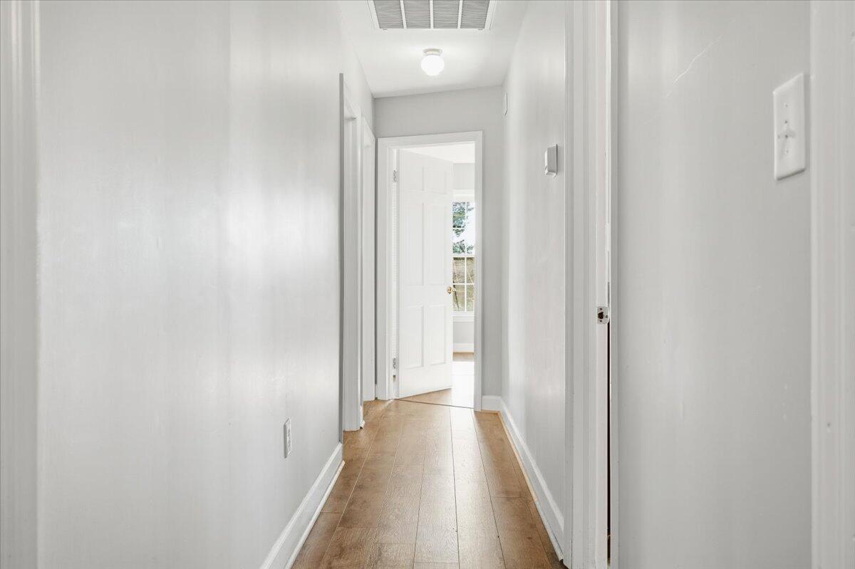 2127-2129 Moneta Road Bedford, VA 24523 - Photo 18 of 66 a view of a hallway with wooden floor