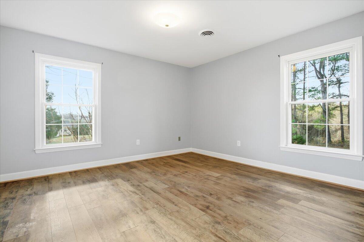 2127-2129 Moneta Road Bedford, VA 24523 - Photo 24 of 66 a view of an empty room with a window