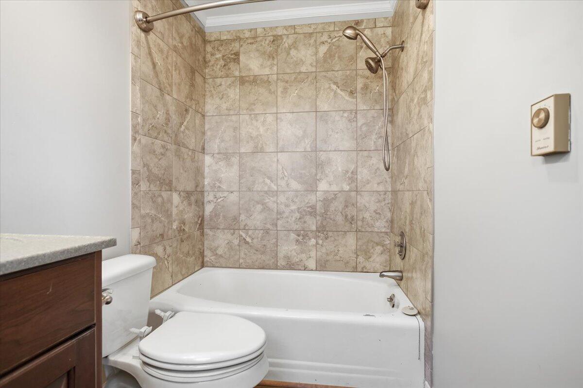 2127-2129 Moneta Road Bedford, VA 24523 - Photo 27 of 66 a bathroom with a toilet and a bathtub