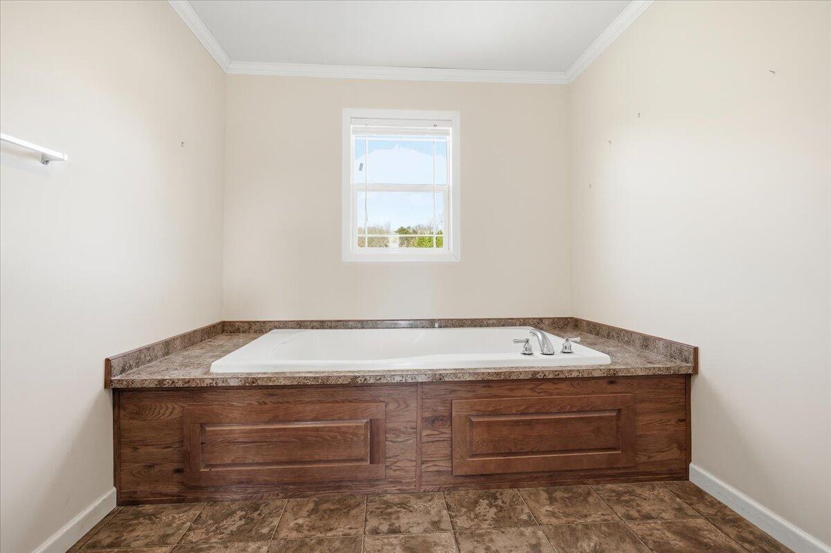 2127-2129 Moneta Road Bedford, VA 24523 - Photo 43 of 66 a room has a bed and a window