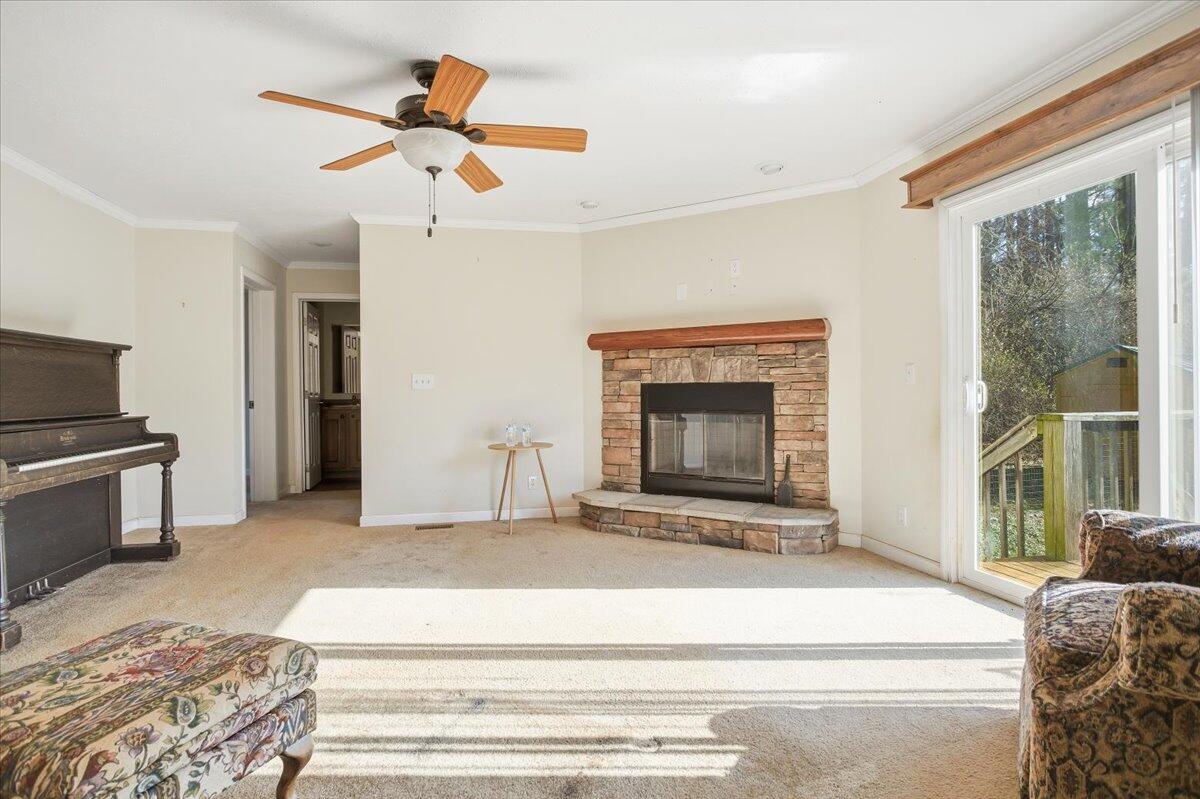 2127-2129 Moneta Road Bedford, VA 24523 - Photo 50 of 66 a living room with furniture and a fireplace