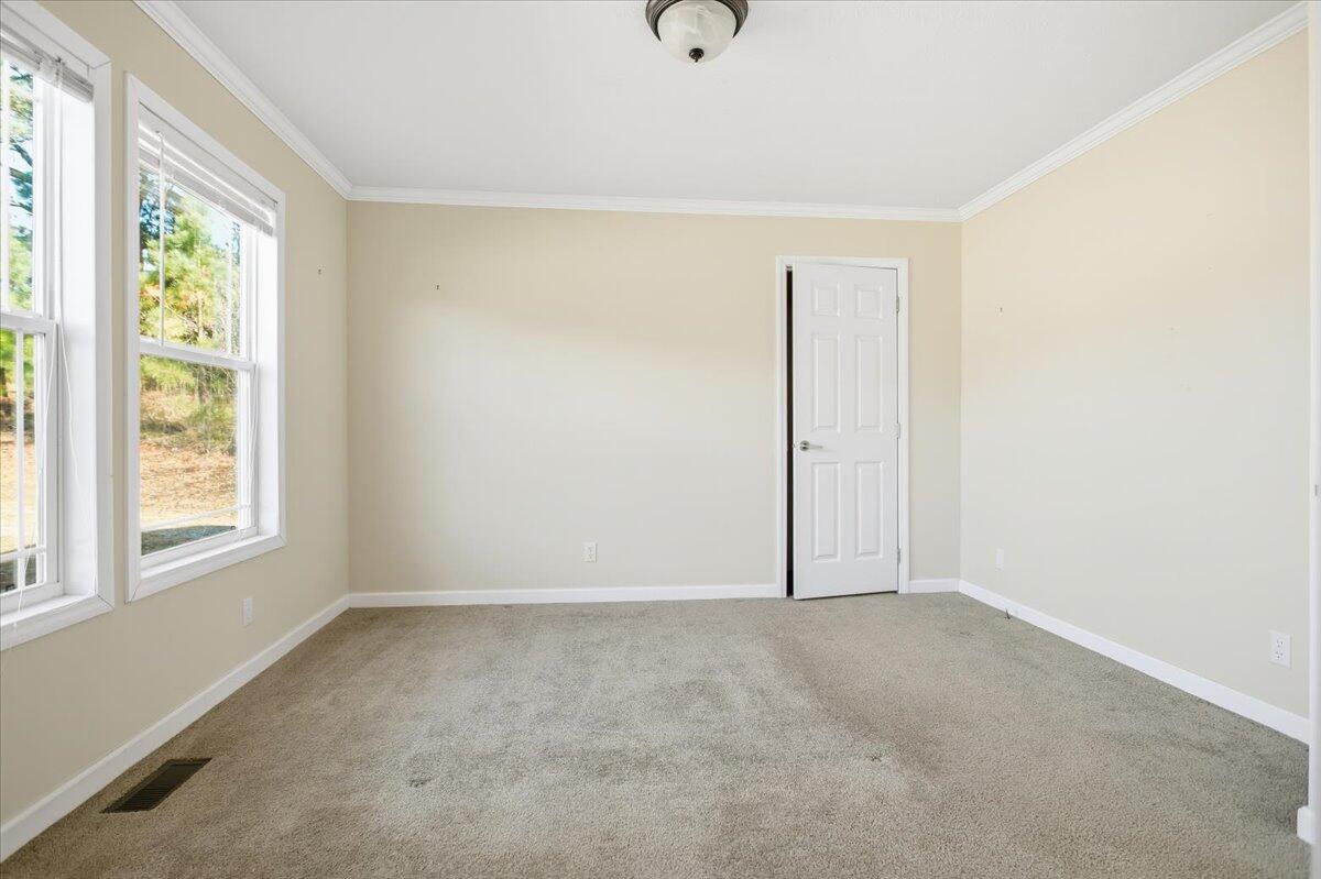 2127-2129 Moneta Road Bedford, VA 24523 - Photo 56 of 66 an empty room with windows