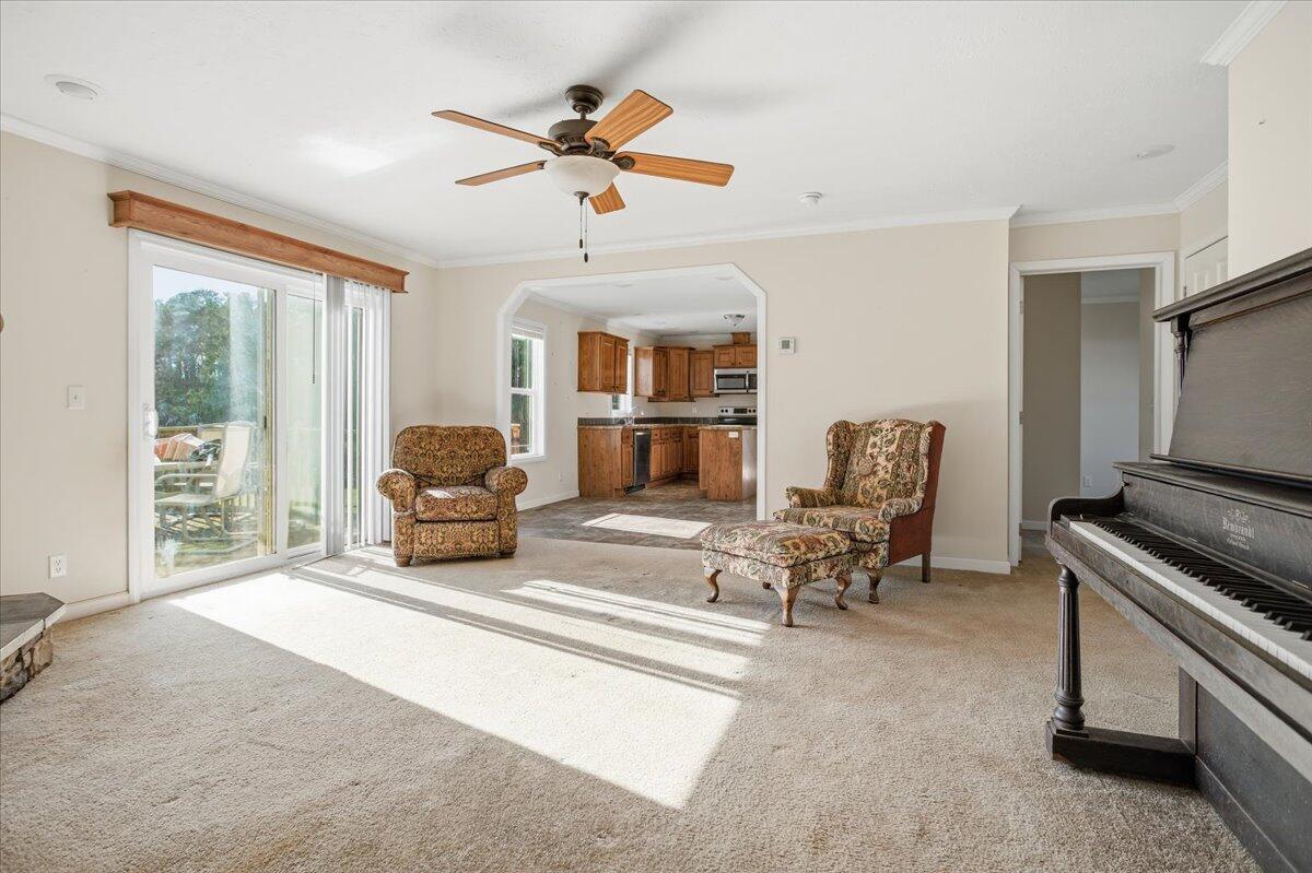 2127-2129 Moneta Road Bedford, VA 24523 - Photo 58 of 66 a living room with furniture a fireplace and a window