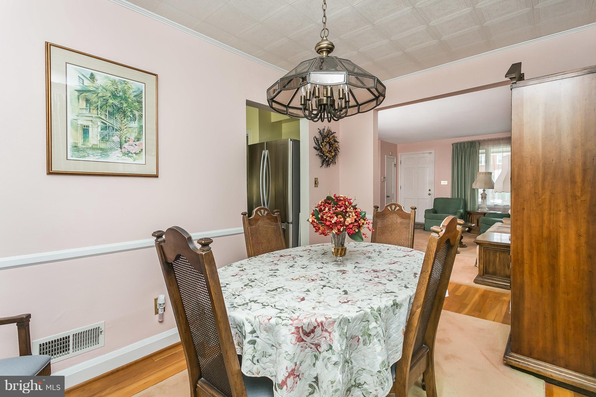 1000 Arncliffe Road Baltimore, MD 21221 - Photo 11 of 36 a view of a dining room with furniture