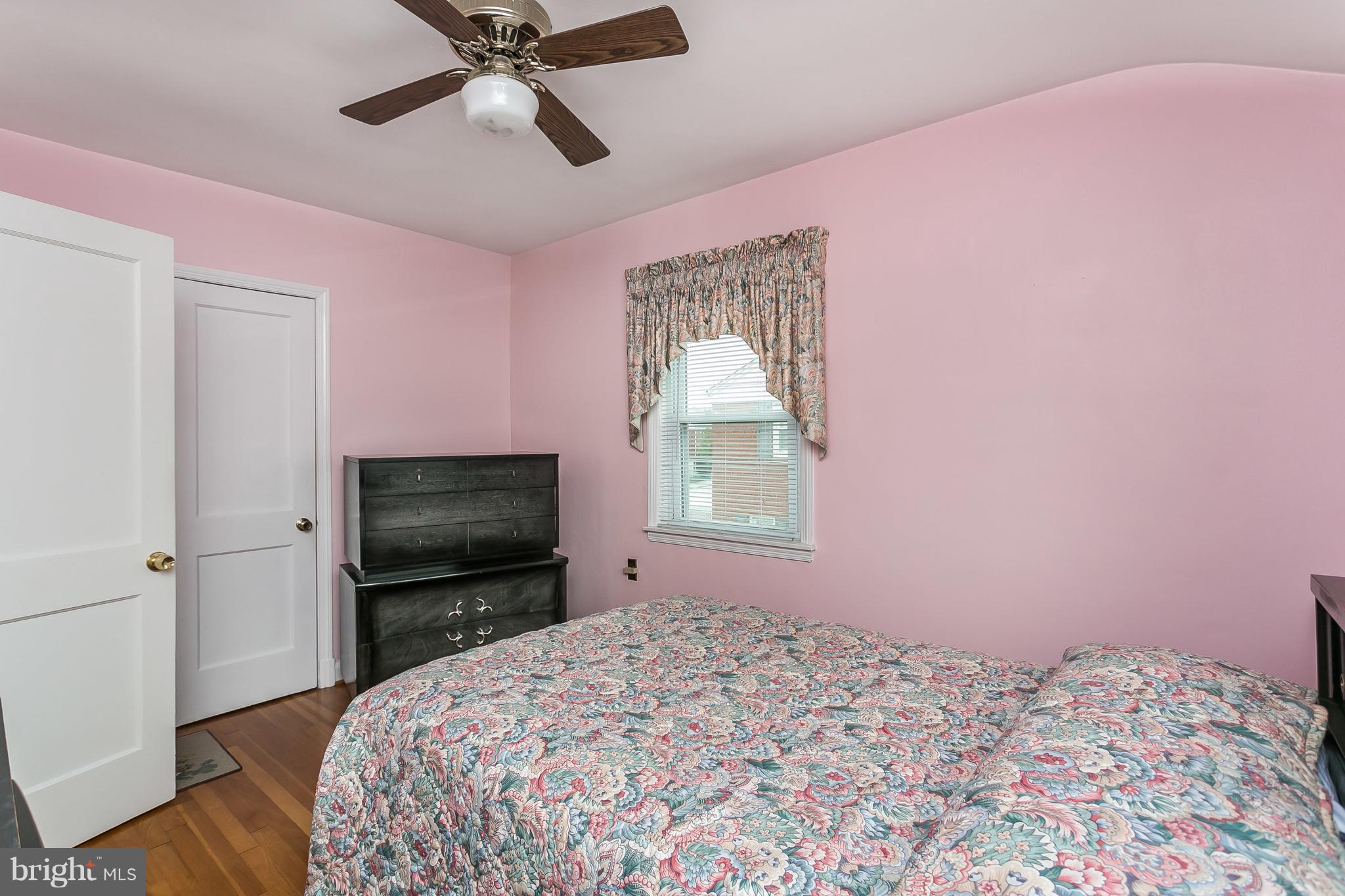 1000 Arncliffe Road Baltimore, MD 21221 - Photo 17 of 36 a bedroom with a bed and a television