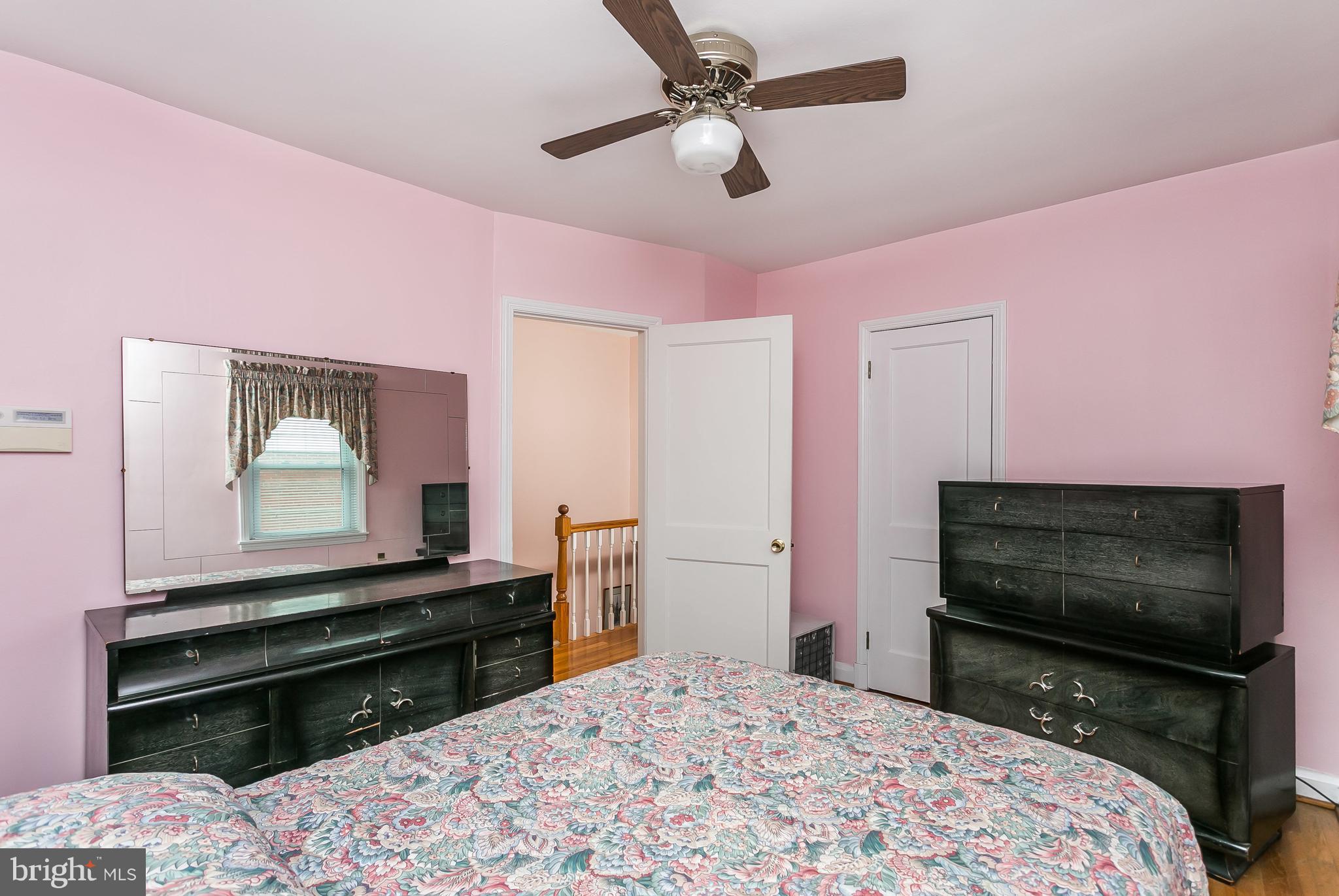 1000 Arncliffe Road Baltimore, MD 21221 - Photo 18 of 36 a bedroom with a bed and a television