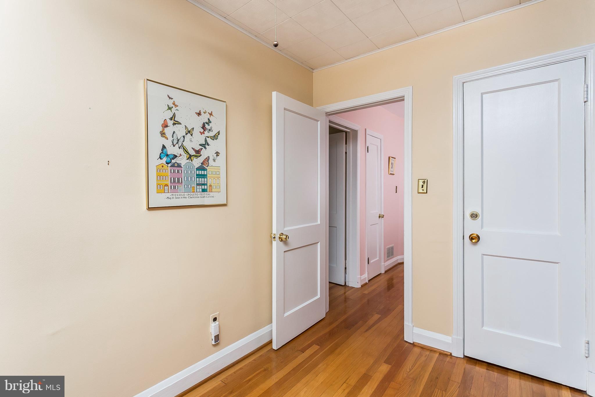 1000 Arncliffe Road Baltimore, MD 21221 - Photo 25 of 36 a view of a hallway with wooden floor and closet