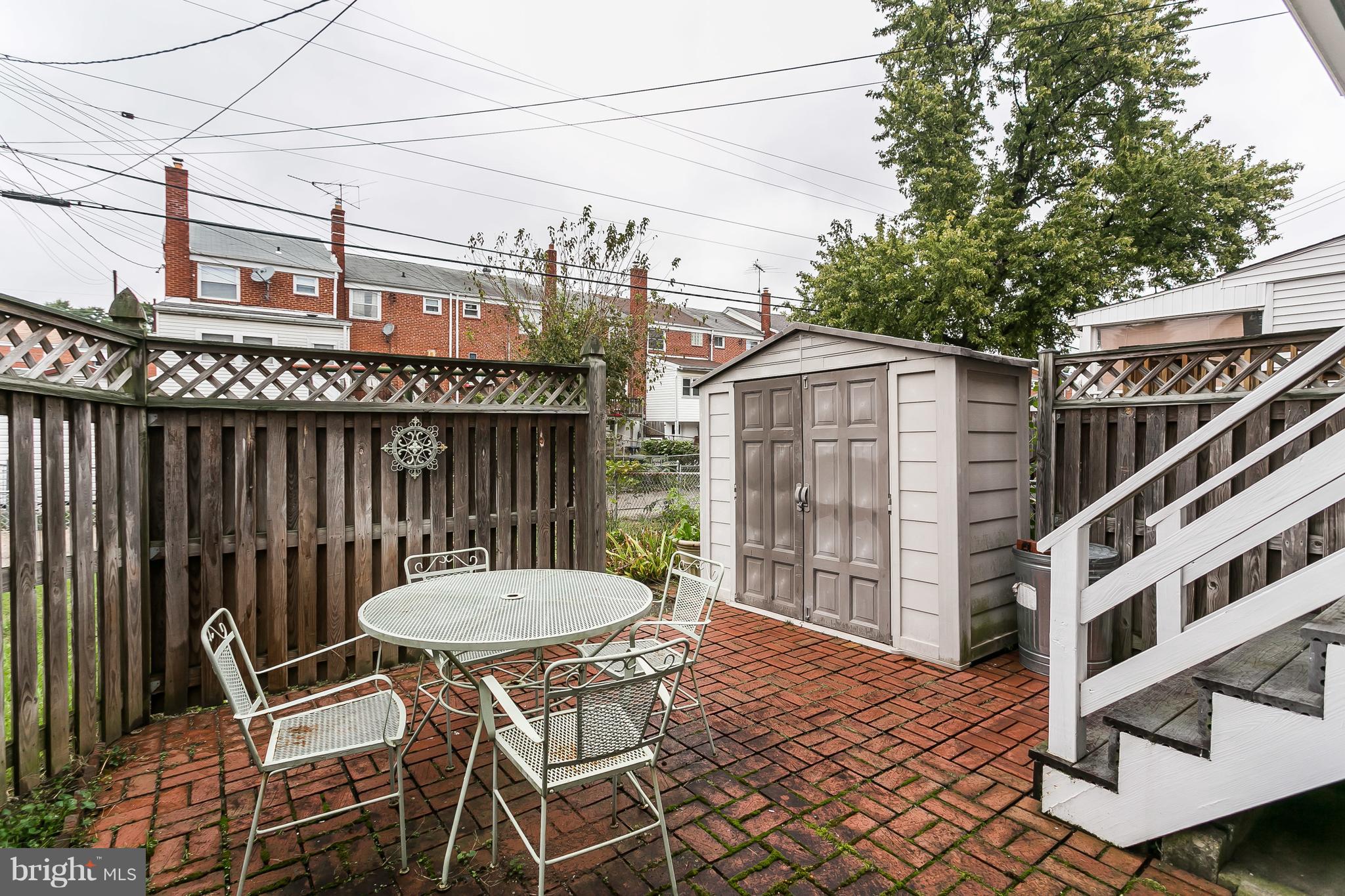 1000 Arncliffe Road Baltimore, MD 21221 - Photo 29 of 36 a view of a chairs and table in the balcony