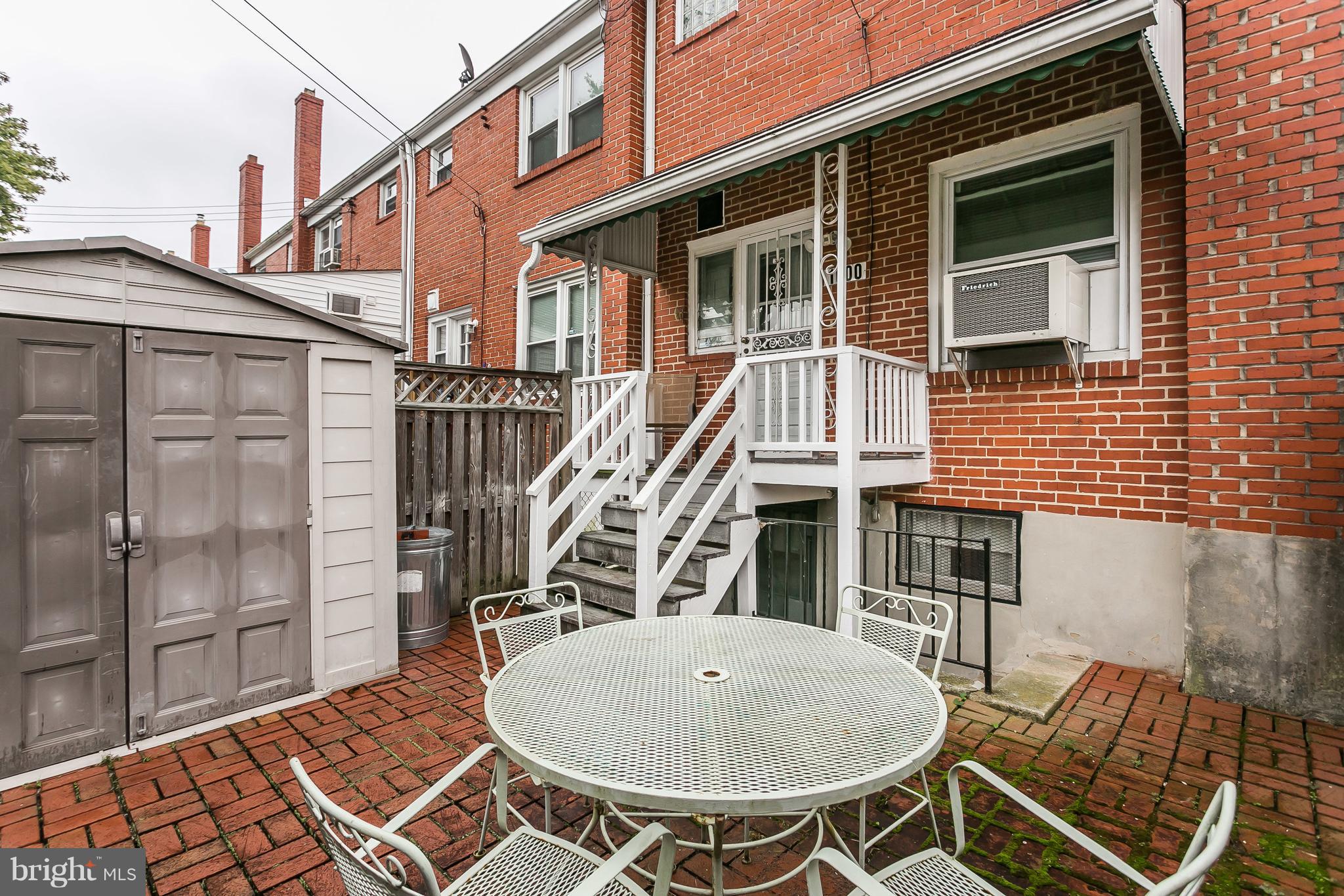 1000 Arncliffe Road Baltimore, MD 21221 - Photo 30 of 36 a view of a house with backyard and deck