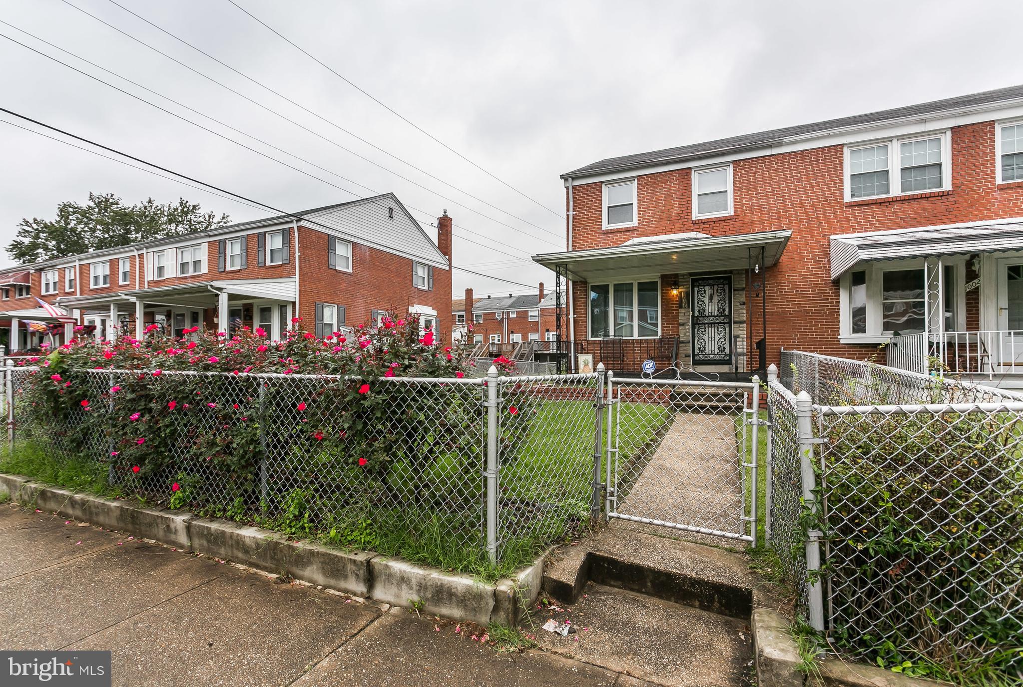 1000 Arncliffe Road Baltimore, MD 21221 - Photo 36 of 36 a front view of a house with a garden