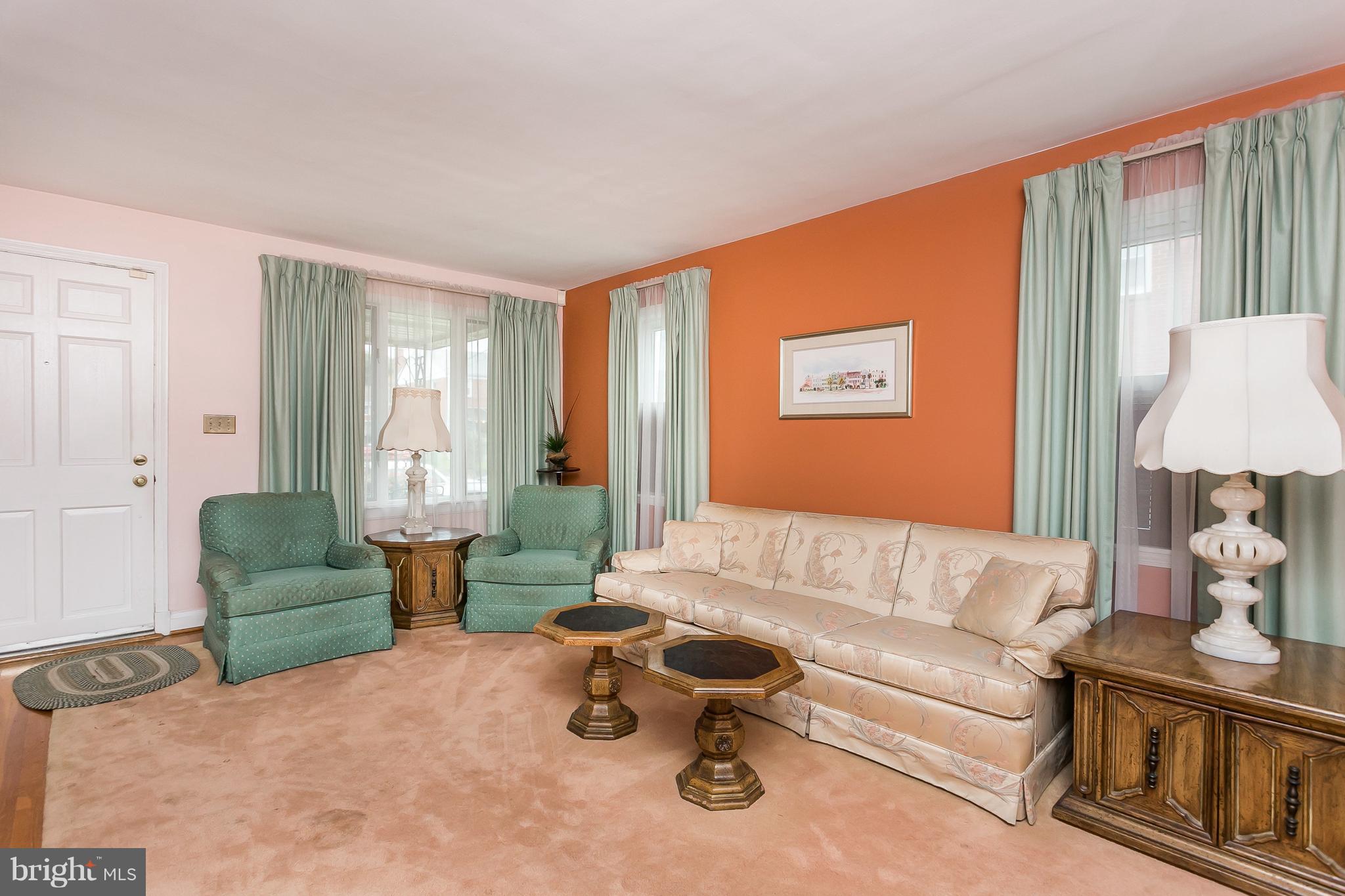 1000 Arncliffe Road Baltimore, MD 21221 - Photo 6 of 36 a living room with furniture and a table