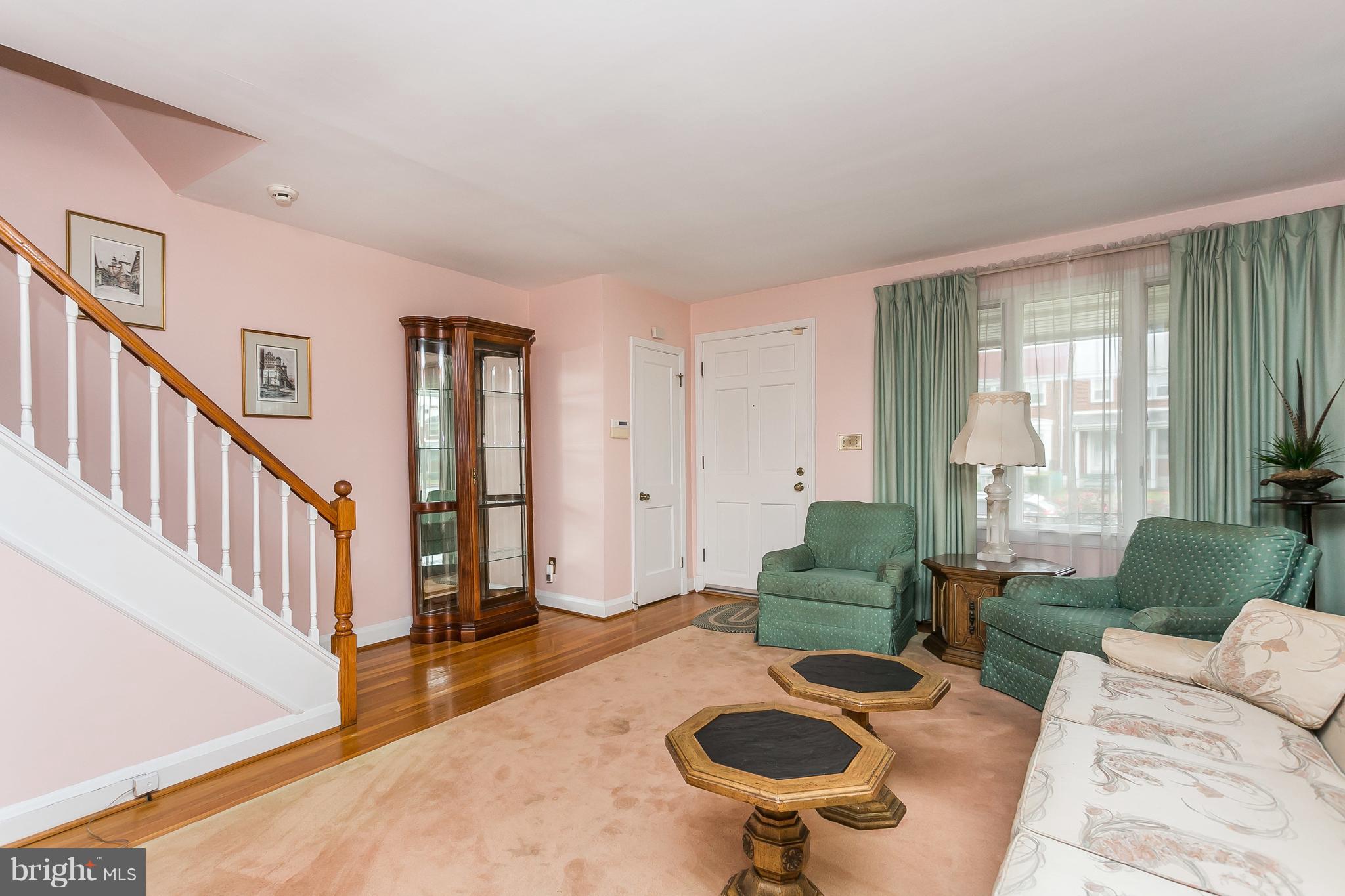 1000 Arncliffe Road Baltimore, MD 21221 - Photo 7 of 36 a living room with furniture and a table