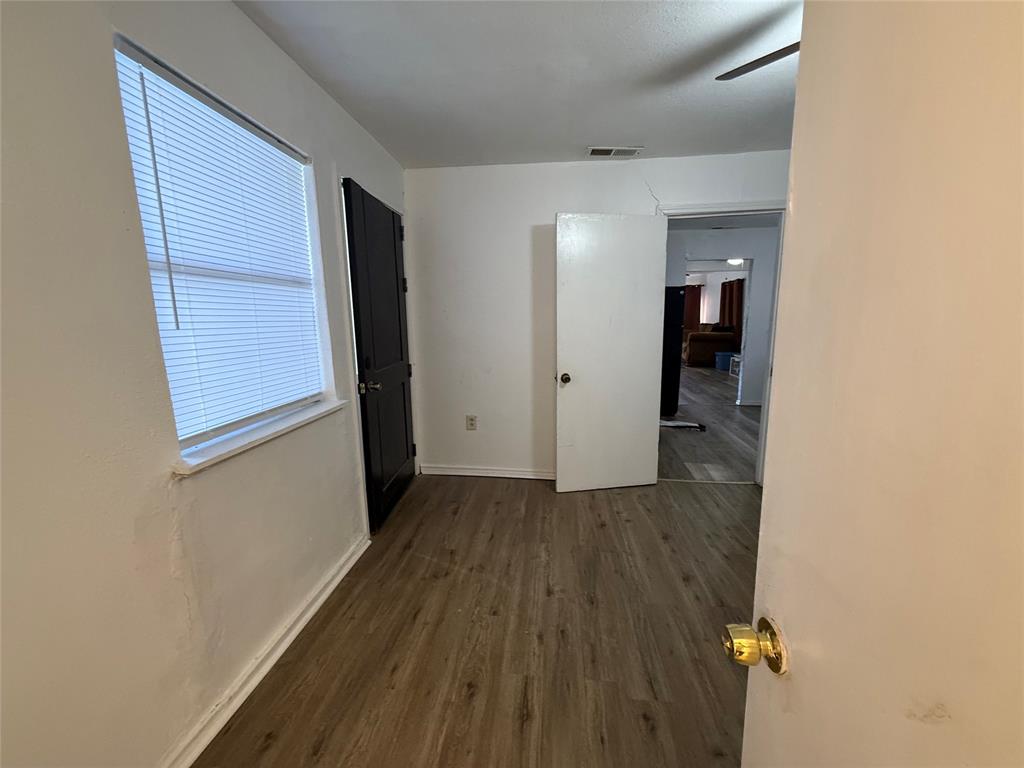 2912 Frazier Street Dallas, TX 75210 - Photo 25 of 36 a view of hallway with wooden floor