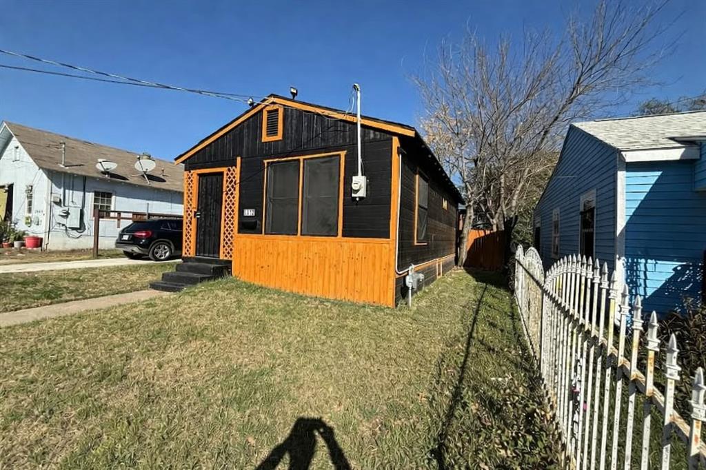 2912 Frazier Street Dallas, TX 75210 - Photo 35 of 36 a front view of a house with a yard