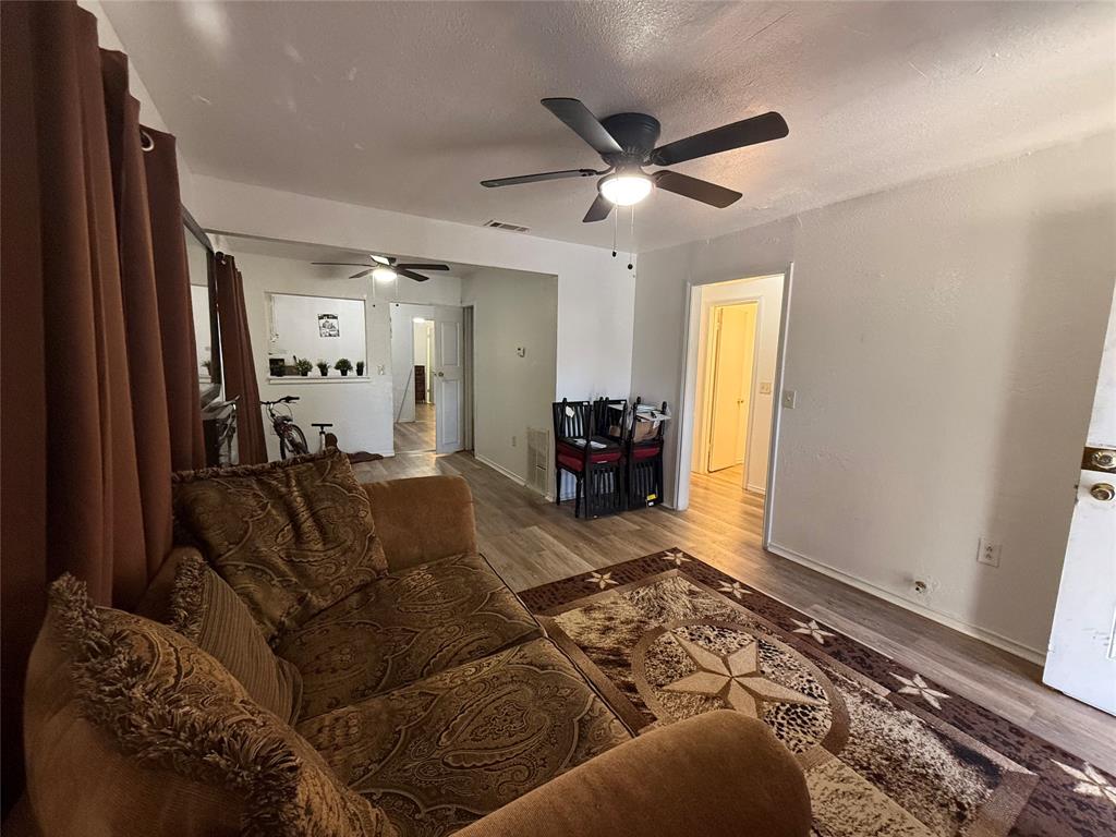 2912 Frazier Street Dallas, TX 75210 - Photo 5 of 36 a living room with furniture and a window