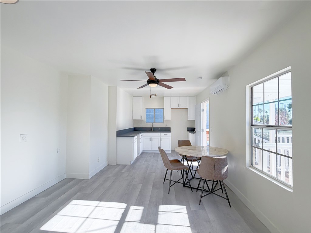 285 Parke Street Pasadena, CA 91101 - Photo 11 of 24 a view of a dining room with furniture and window