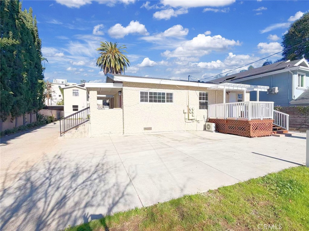 285 Parke Street Pasadena, CA 91101 - Photo 3 of 24 a view of a house with a patio