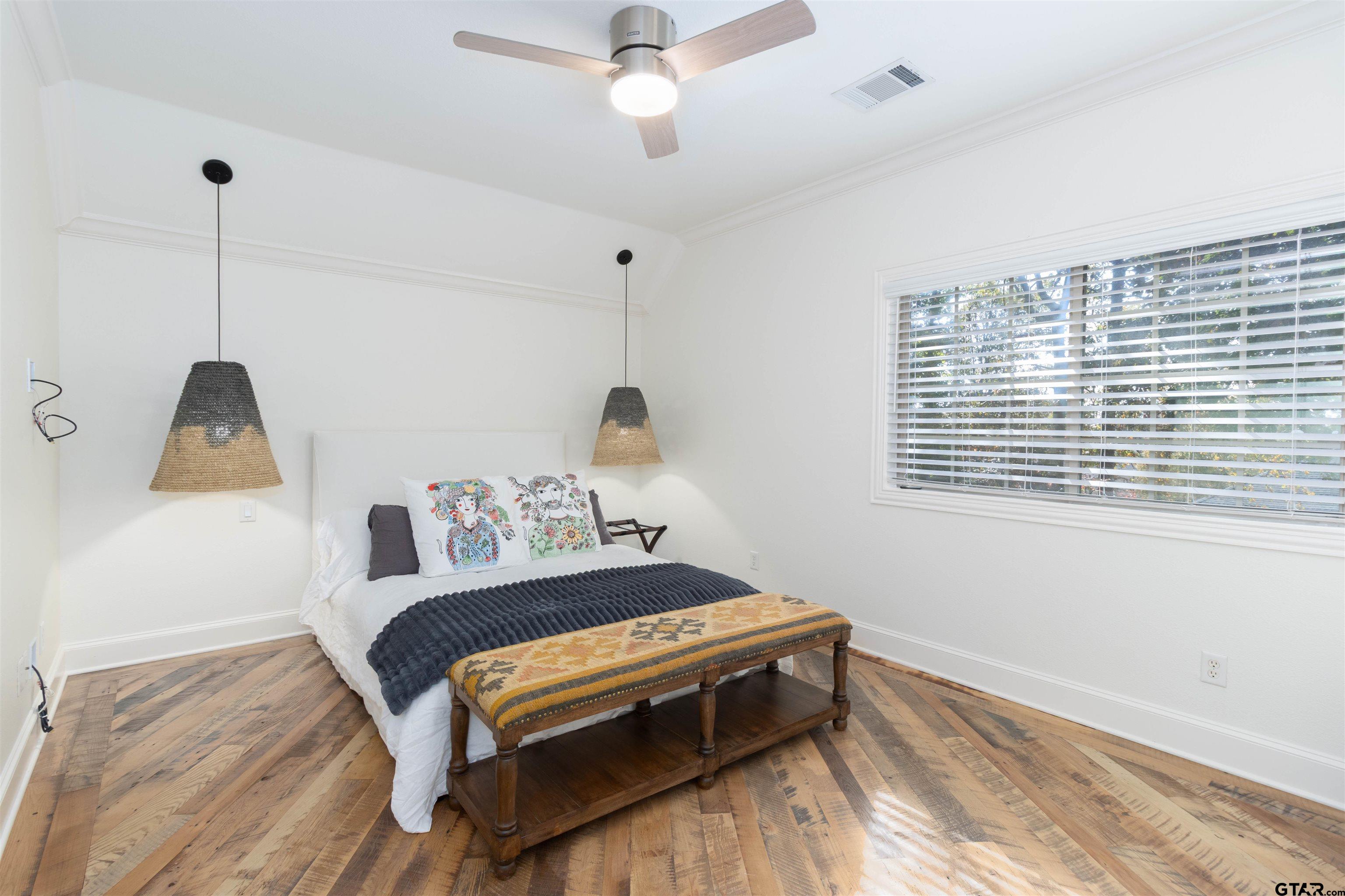 4534 Triggs Trace Tyler, TX 75709 - Photo 18 of 33 a bedroom with a bed and a window