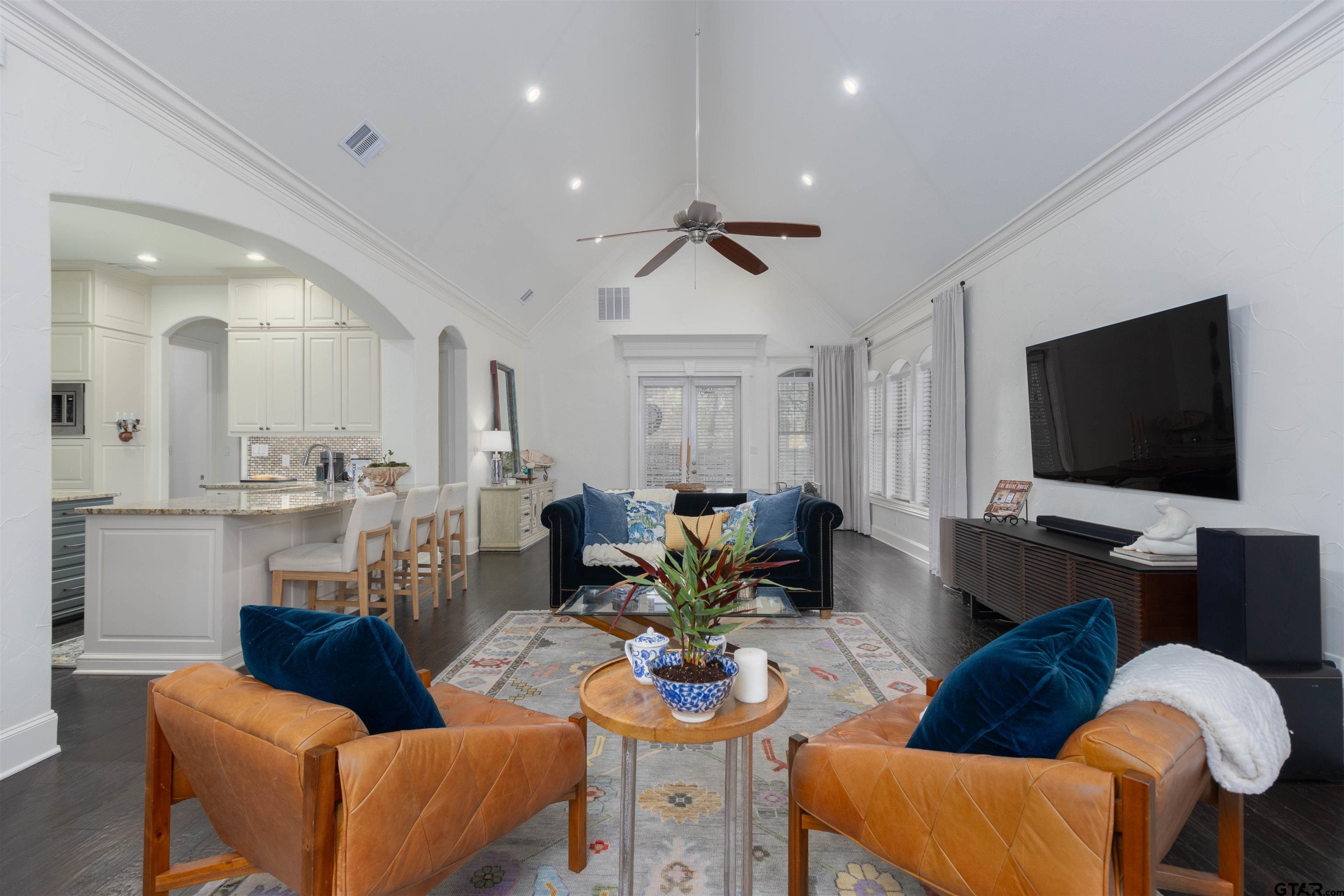 4534 Triggs Trace Tyler, TX 75709 - Photo 4 of 33 a living room with furniture and a flat screen tv