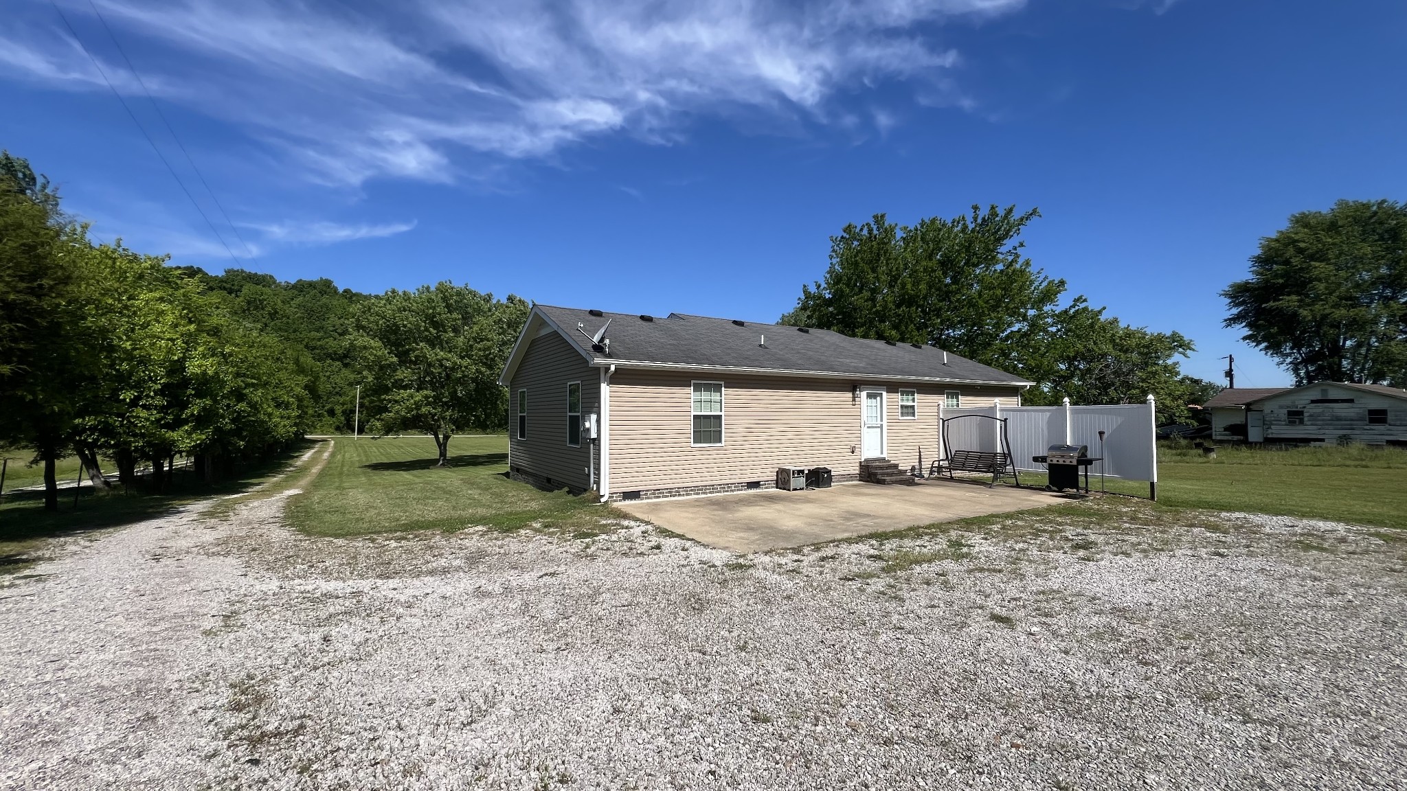 8659 Dog Branch Road Mount Pleasant, TN 38474 - Photo 10 of 44 a house view with a backyard space