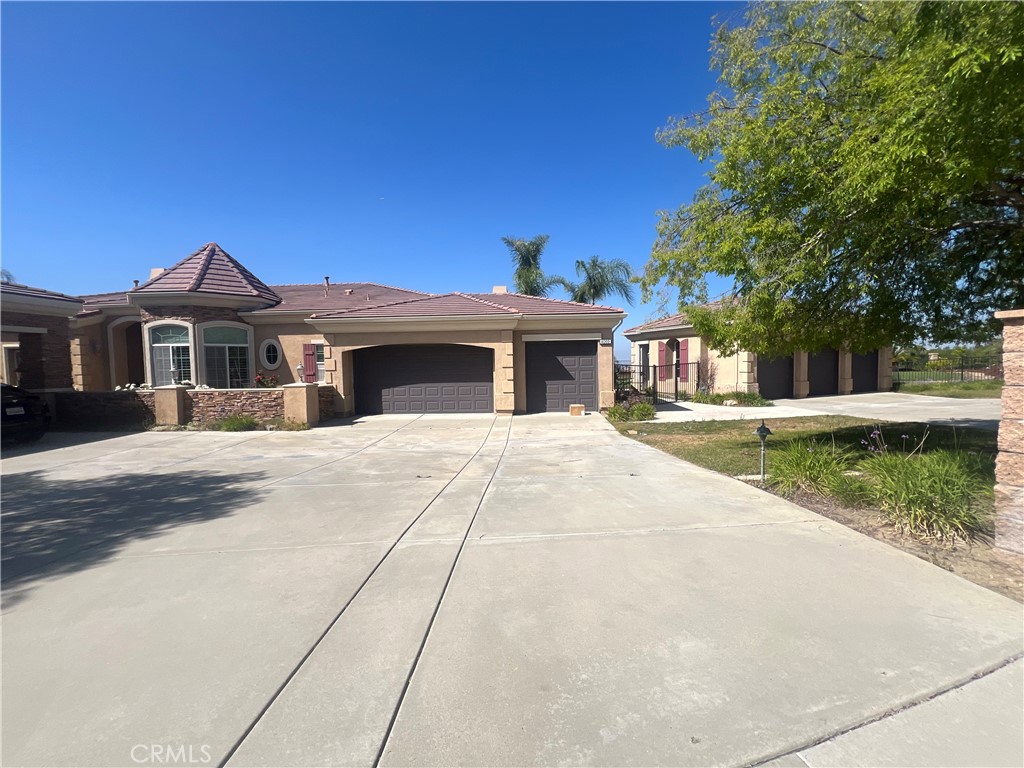 4069 Nancy Circle Corona, CA 92881 - Photo 11 of 73 a front view of a house with a yard