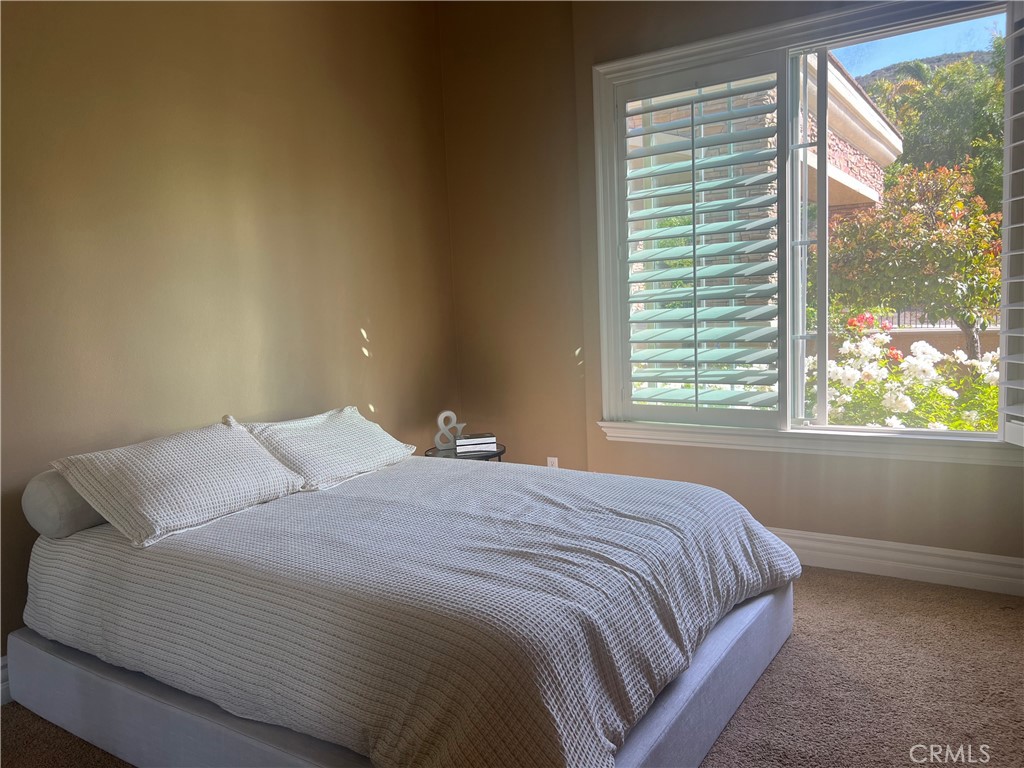 4069 Nancy Circle Corona, CA 92881 - Photo 50 of 73 a bedroom with a bed and a window