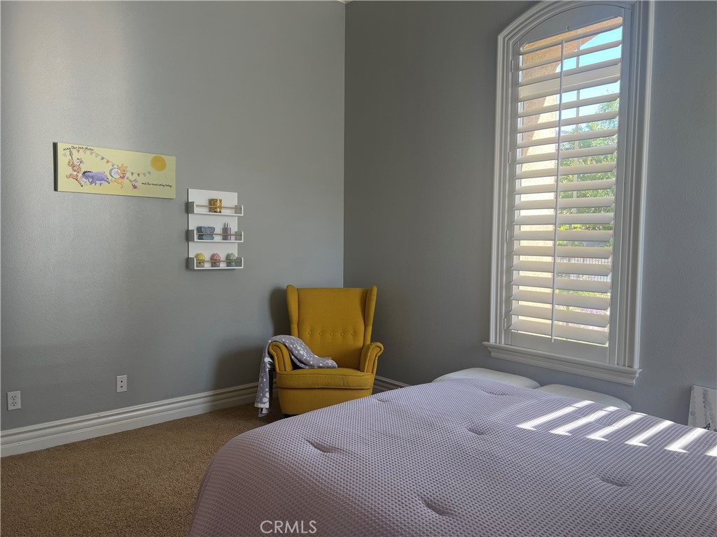 4069 Nancy Circle Corona, CA 92881 - Photo 53 of 73 a bedroom with a bed and a window