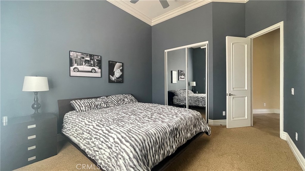 4069 Nancy Circle Corona, CA 92881 - Photo 58 of 73 a bedroom with a bed and painting on the wall